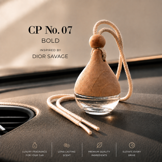 A car air freshener diffuser bottle labeled 'CP No. 07 BOLD' resting on a car dashboard.